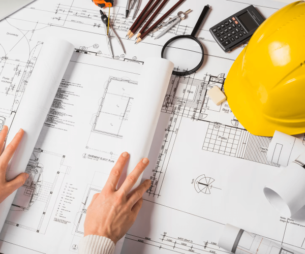 crop-architect-opening-blueprint_23-2147710985